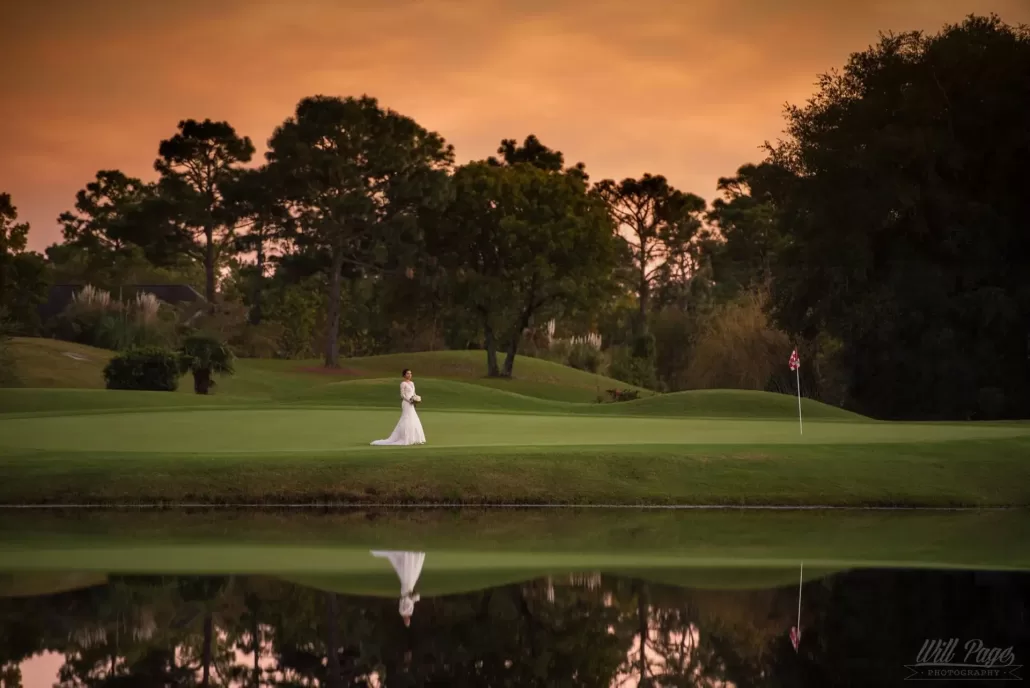 Bride on the golf course at the Beau Rivage Golf and Resort at sunset