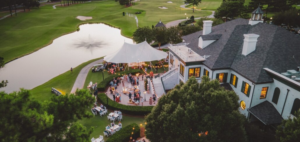 Aerial photo of the back patio at Porters Neck Country Club during a party