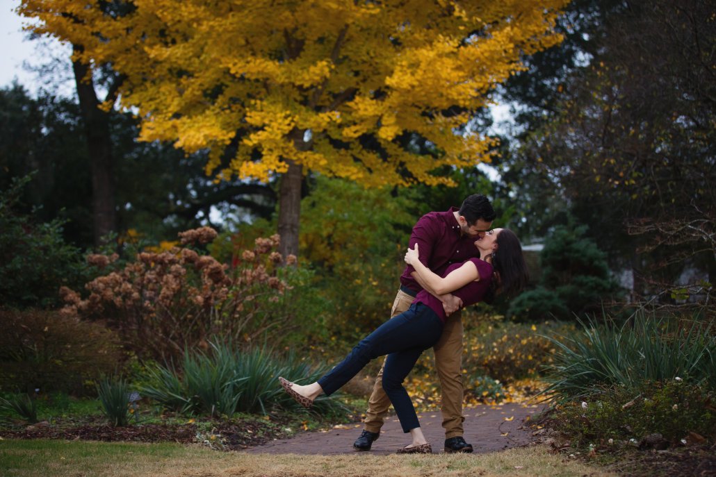 Couple outside at the New Hanover County Arboretum during fall